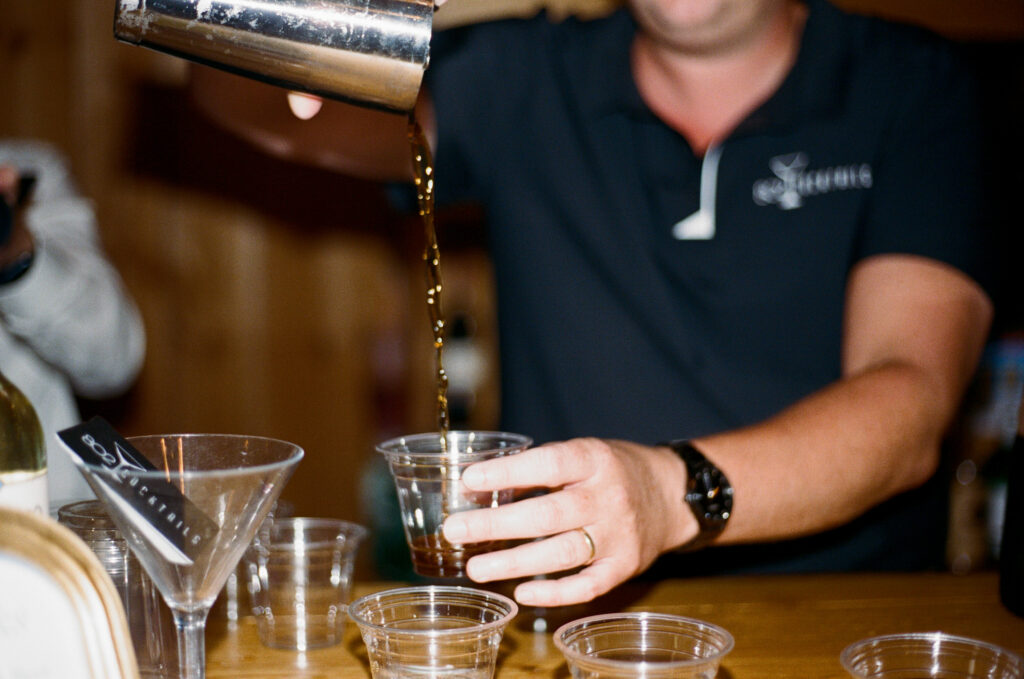 espresso martini shots being made by bar staff at wedding in New England