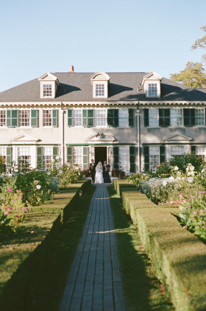 bride walking down aisle at her Hildene wedding in Vermont