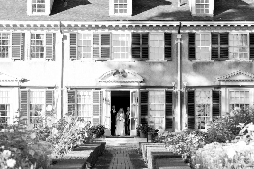 bride walking down aisle during her vermont wedding