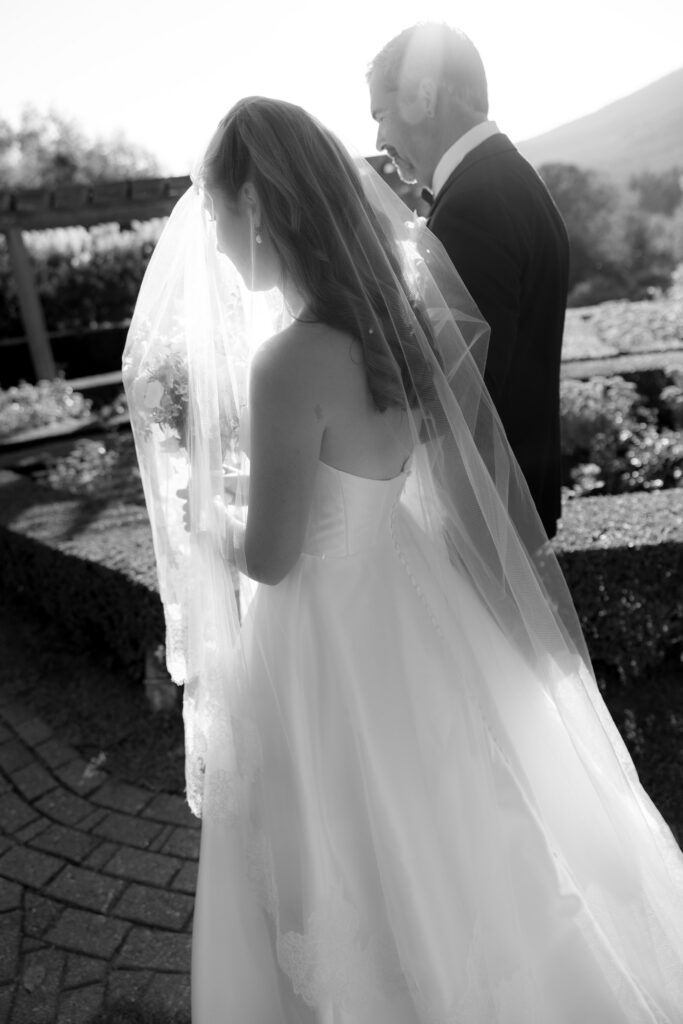 bride and father walking down aisle during vermont wedding